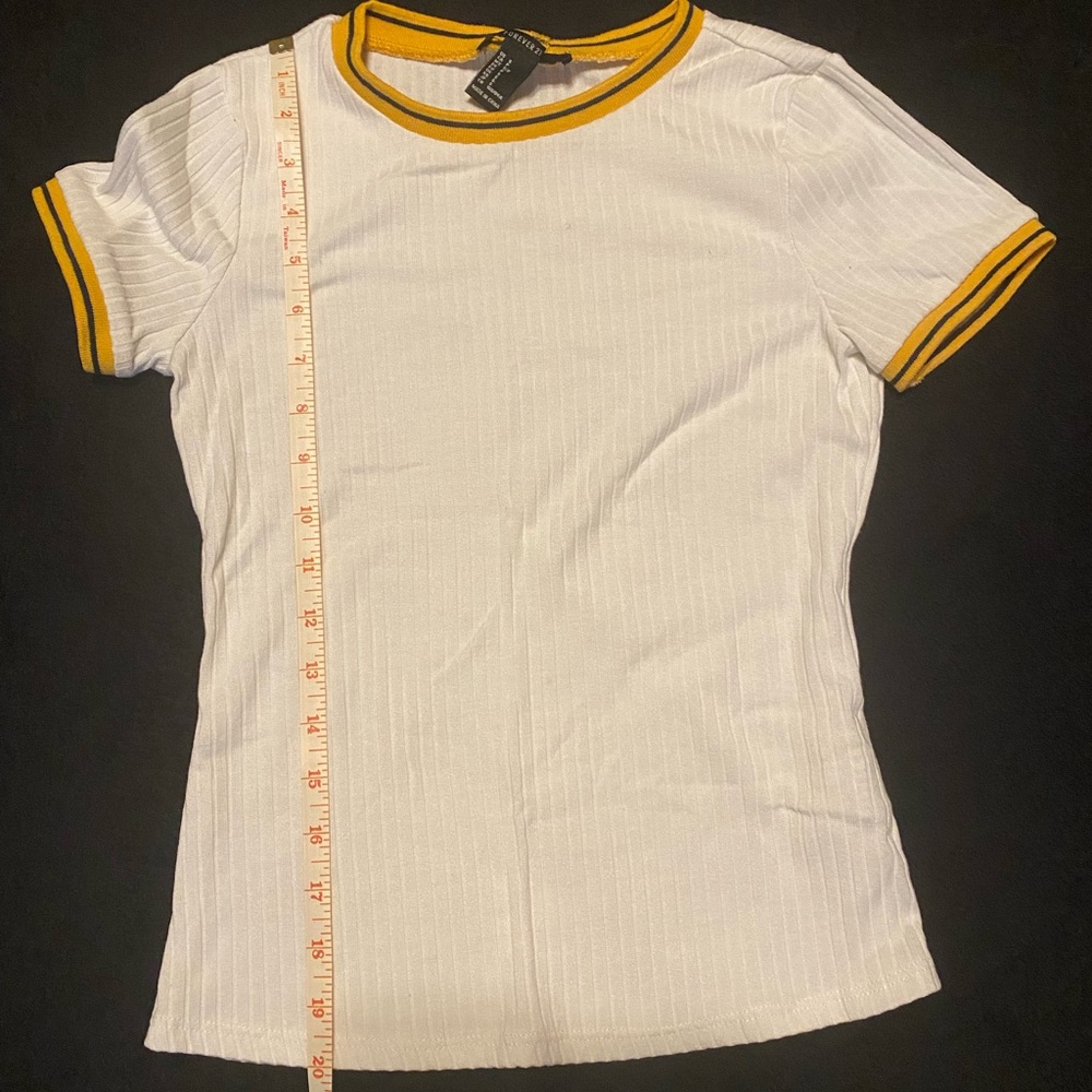 White top with colored collar and sleeve